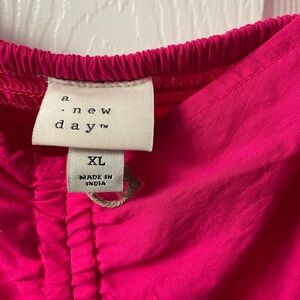 Bright pink fuchsia, long sleeve top XL new with tags stretch fit in the back